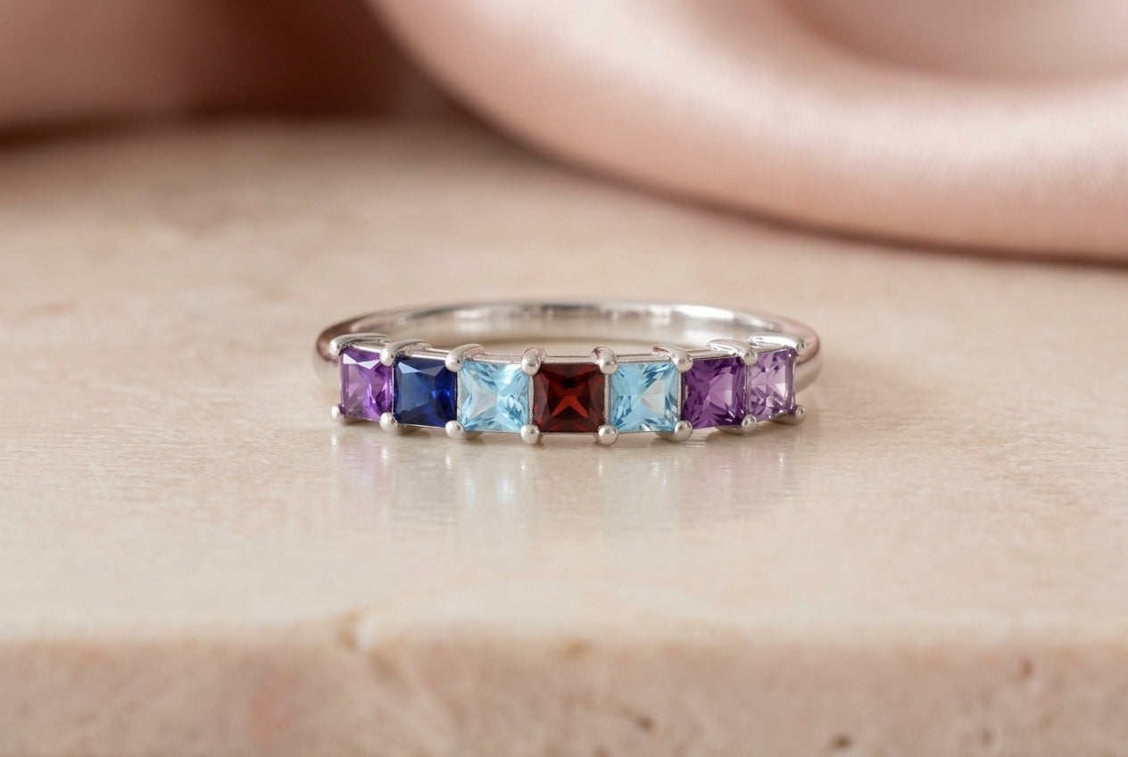 Seven princess-cut birthstone ring hero
