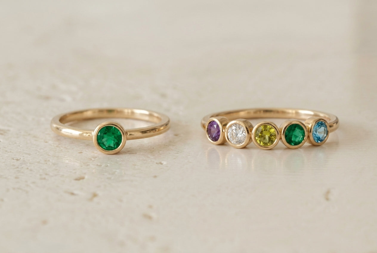Single birthstone versus five bezel stones