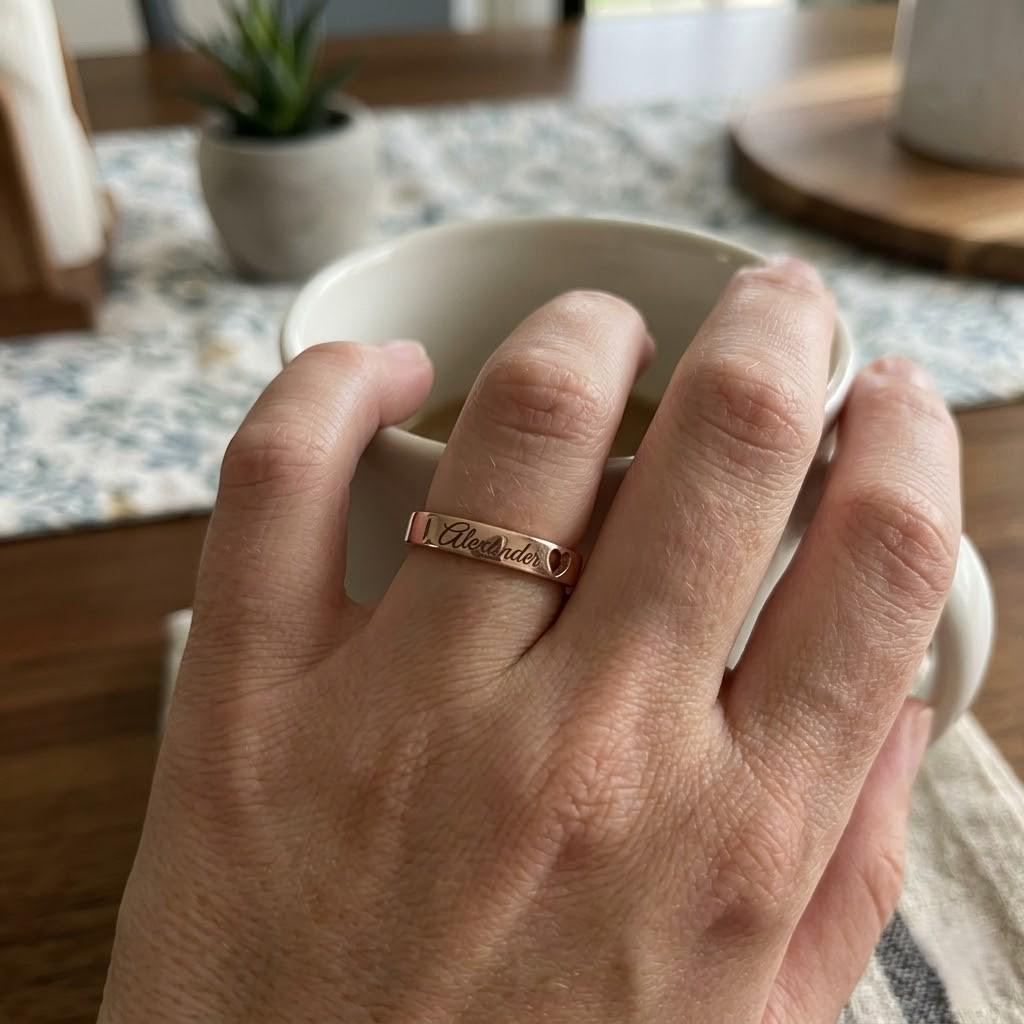 Personalized name and date ring with engraved heart detail