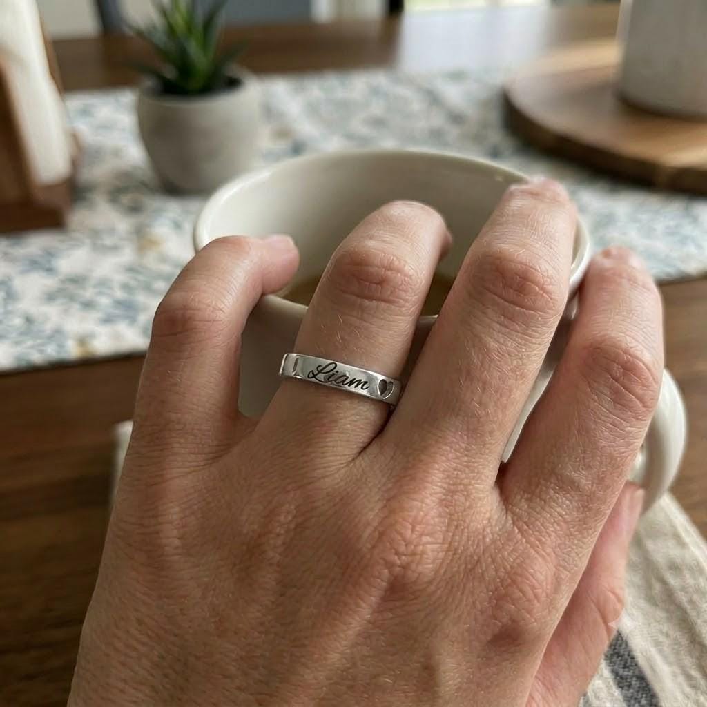 Personalized name and date ring with engraved heart detail