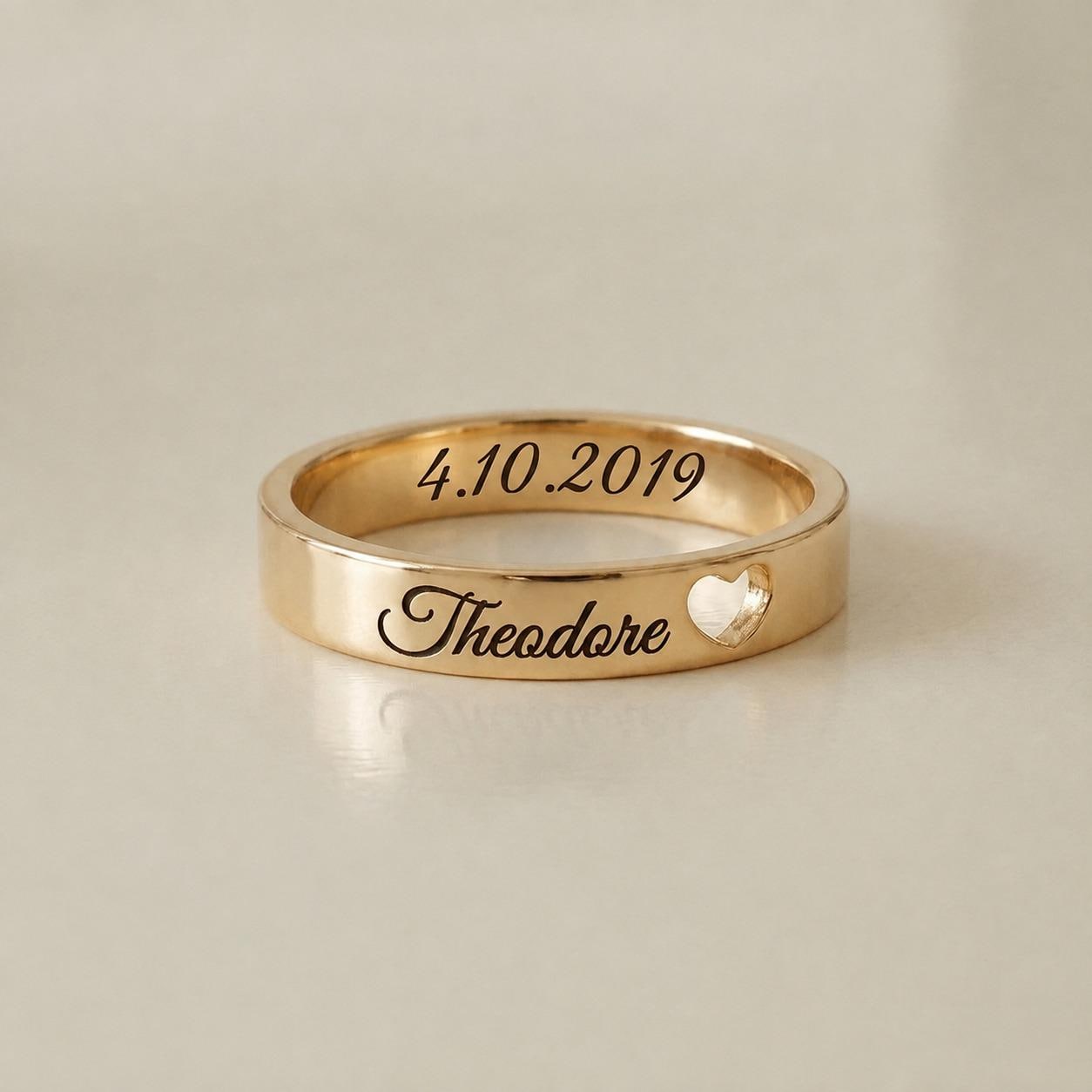 Personalized name and date ring with engraved heart detail